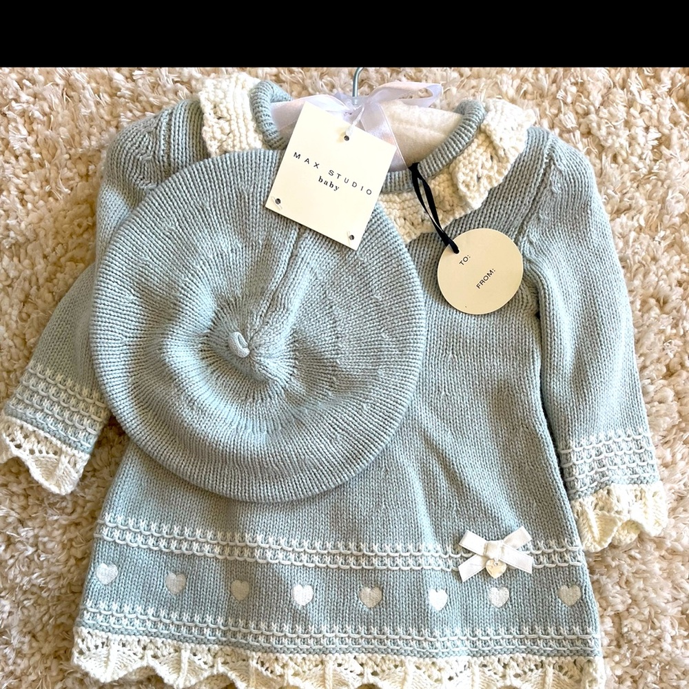 Sweater dress with tights and bonnet